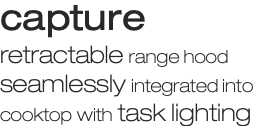 capture retractable range hood seamlessly integrated into cooktop with task lighting 